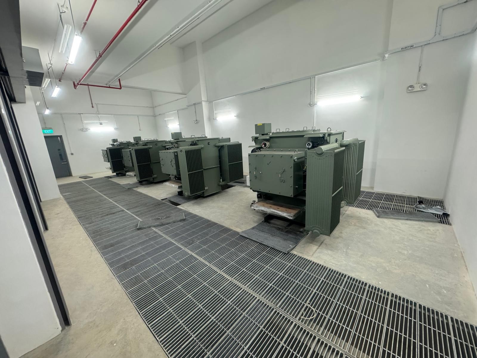 Electrical equipment in a substation room.